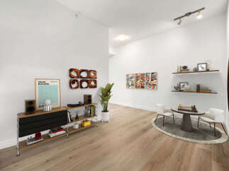 Experience modern living in this stylish apartment, featuring a spacious open-concept living area perfect for entertaining.