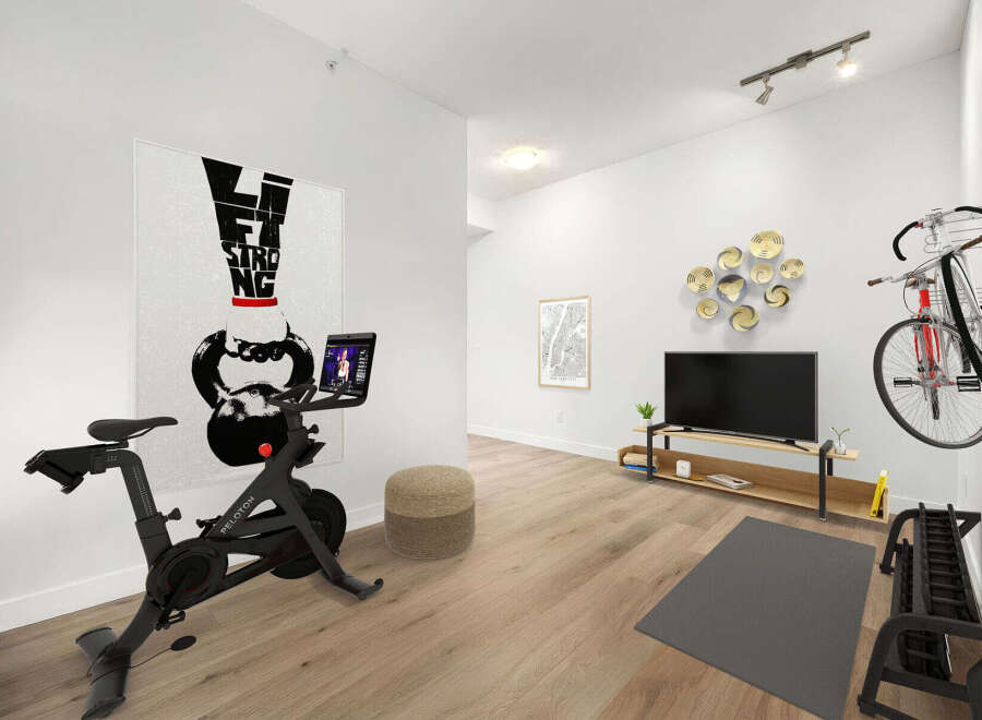 Transform your home into a personal fitness sanctuary with this dedicated workout space.
