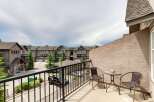 Enjoy your morning coffee or evening relaxation on this private balcony overlooking a charming neighborhood.