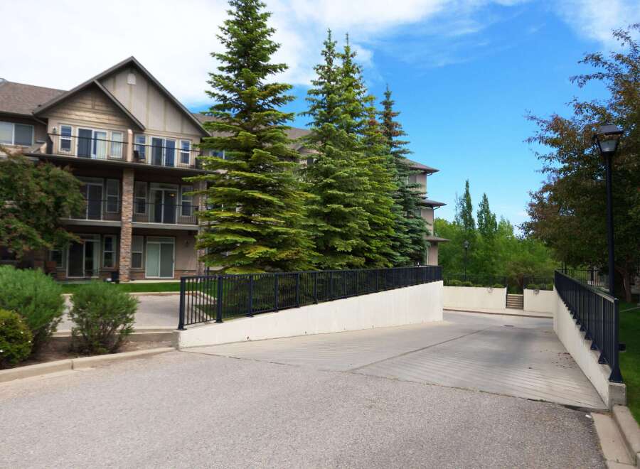 Discover modern living in this multi-story apartment complex, featuring private balconies and spacious units.