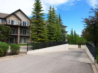 Discover modern living in this multi-story apartment complex, featuring private balconies and spacious units.