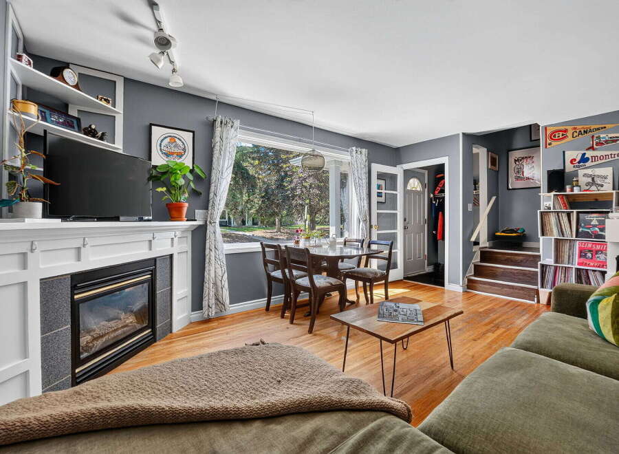 Step into this inviting living and dining area, perfect for both relaxation and entertaining.