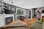 Step into this inviting living and dining area, perfect for both relaxation and entertaining.