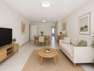 Experience modern living in this beautifully staged open-concept living and dining area.