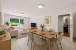 Experience modern living in this beautifully appointed dining and living area, featuring a sleek dining table set for six and a comfortable sofa.
