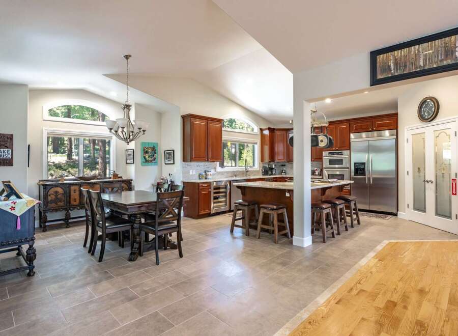 Experience spacious living in this open-concept kitchen and dining area, perfect for entertaining.