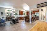 Experience spacious living in this open-concept kitchen and dining area, perfect for entertaining.