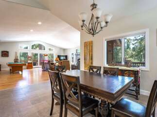 Experience the ultimate mountain retreat with this spacious open-concept living area, perfect for entertaining.