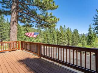 Enjoy breathtaking mountain views from this stunning deck, perfect for outdoor entertaining or quiet relaxation.