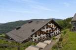 Discover this charming property nestled amidst rolling green hills and lush forests, offering breathtaking panoramic views.