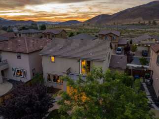 Experience luxury living in this stunning home, featuring a modern design and breathtaking mountain views.