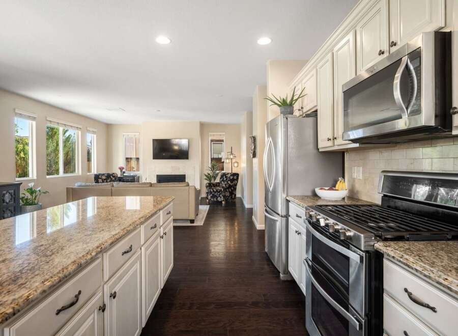 Experience seamless indoor-outdoor living in this beautifully appointed kitchen and living area.