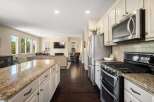 Experience seamless indoor-outdoor living in this beautifully appointed kitchen and living area.