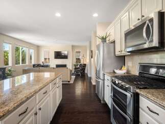 Experience seamless indoor-outdoor living in this beautifully appointed kitchen and living area.