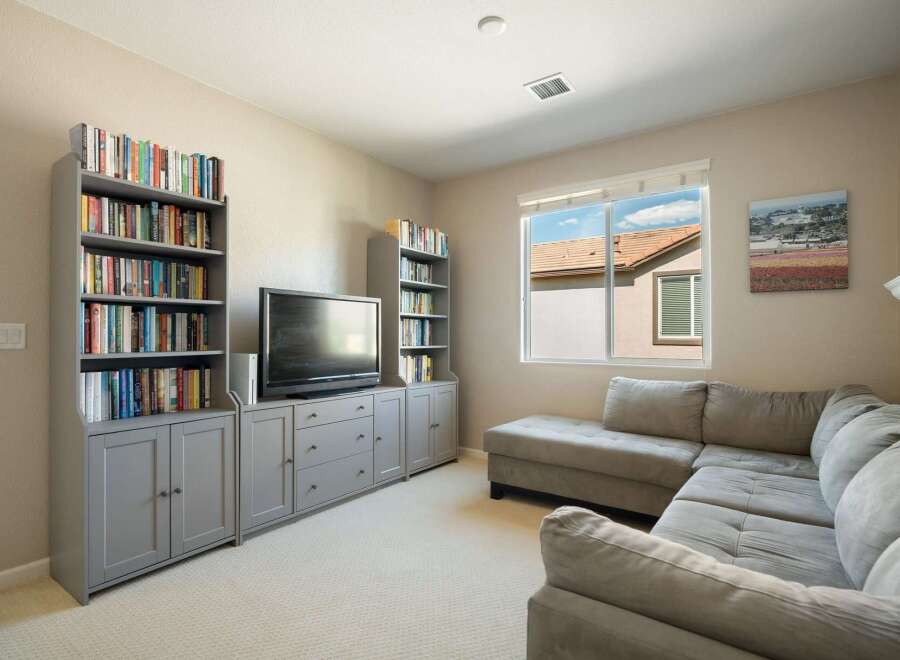 This cozy living room features a large sectional sofa perfect for relaxing and entertaining.