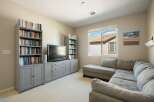 This cozy living room features a large sectional sofa perfect for relaxing and entertaining.