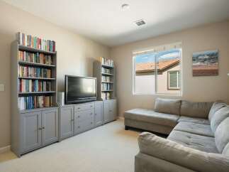 This cozy living room features a large sectional sofa perfect for relaxing and entertaining.