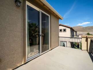 Enjoy the outdoors from this spacious balcony, perfect for morning coffee or evening relaxation.