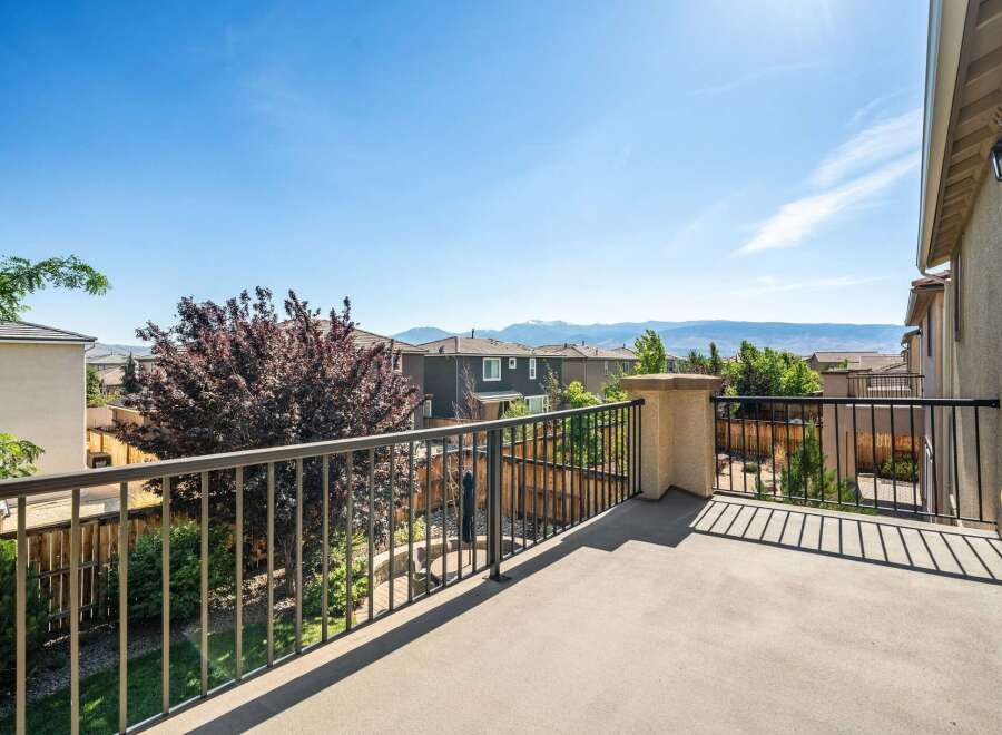 Enjoy breathtaking mountain views from this spacious balcony, perfect for outdoor entertaining or quiet relaxation.