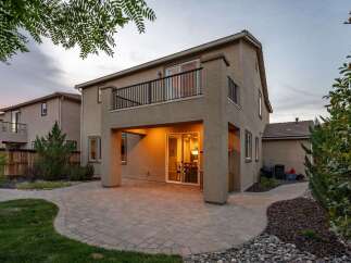 Enjoy outdoor living with this spacious patio and balcony, perfect for entertaining or relaxing.