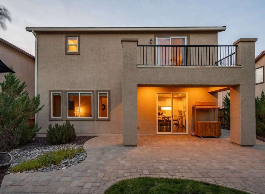 Step into this inviting backyard oasis, perfect for entertaining and relaxation.