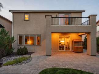 Step into this inviting backyard oasis, perfect for entertaining and relaxation.