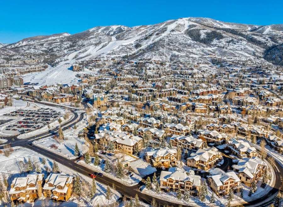Experience luxury mountain living in this stunning ski resort community, nestled amidst snow-capped peaks and evergreen forests.