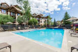 Enjoy a refreshing dip in this stunning outdoor swimming pool, perfect for relaxation and recreation.