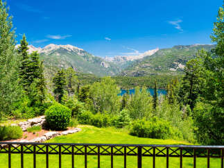 Experience breathtaking mountain views and serene lake vistas from this stunning property.
