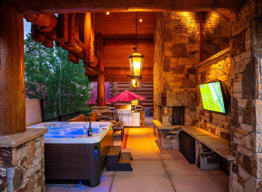 Experience ultimate relaxation and entertainment in this luxurious outdoor living space.