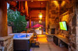 Experience ultimate relaxation and entertainment in this luxurious outdoor living space.