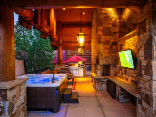 Experience ultimate relaxation and entertainment in this luxurious outdoor living space.