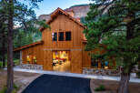 Experience the ultimate mountain lifestyle in this stunning custom-built barn, perfect for car enthusiasts and outdoor adventurers.
