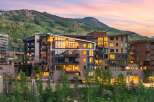 Experience luxury mountain living in this stunning property, featuring modern architecture with warm wood accents and expansive windows that capture breathtaking views.