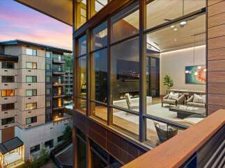 Experience luxury living in this stunning modern apartment with floor-to-ceiling windows offering breathtaking views.