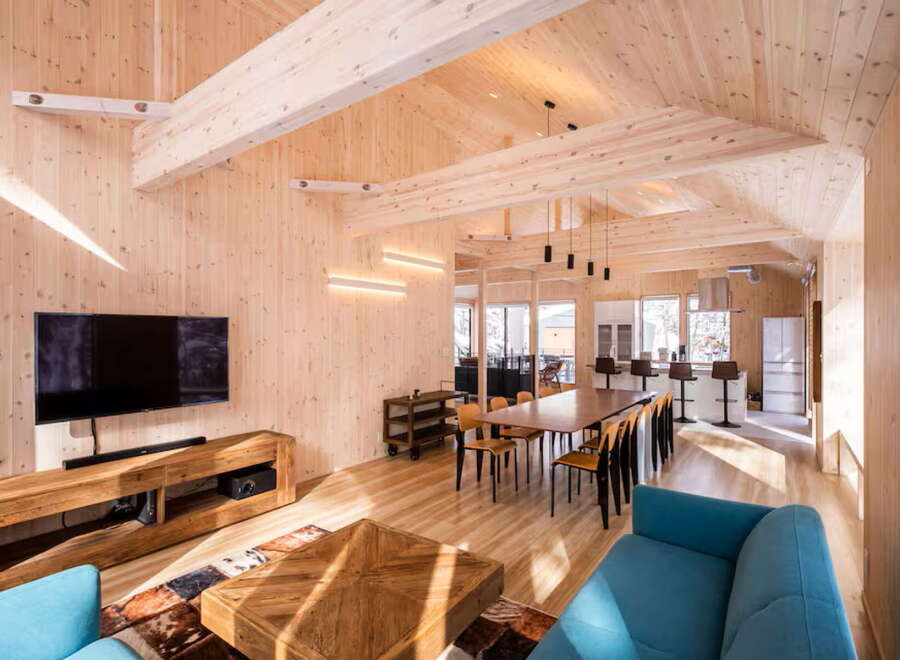 Experience modern living in this stunning timber-framed home, featuring an open-concept living and dining area perfect for entertaining.