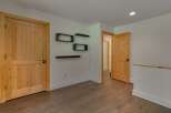 Step into a warm and inviting space featuring beautiful natural wood doors and flooring.
