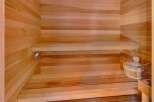 Experience ultimate relaxation in this beautifully crafted wooden sauna.