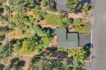 Discover this charming property featuring a spacious deck with a relaxing hot tub, perfect for unwinding.