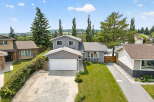 Discover this charming two-story home featuring a spacious two-car garage and a beautifully landscaped front yard.