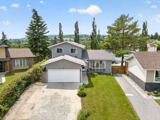 Discover this charming two-story home featuring a spacious two-car garage and a beautifully landscaped front yard.