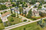 Discover this charming suburban neighborhood with well-maintained homes and lush green spaces.