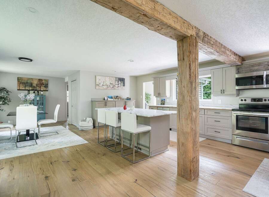 Experience the perfect blend of rustic charm and modern convenience in this beautifully renovated kitchen and dining area.