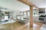 Experience the perfect blend of rustic charm and modern convenience in this beautifully renovated kitchen and dining area.
