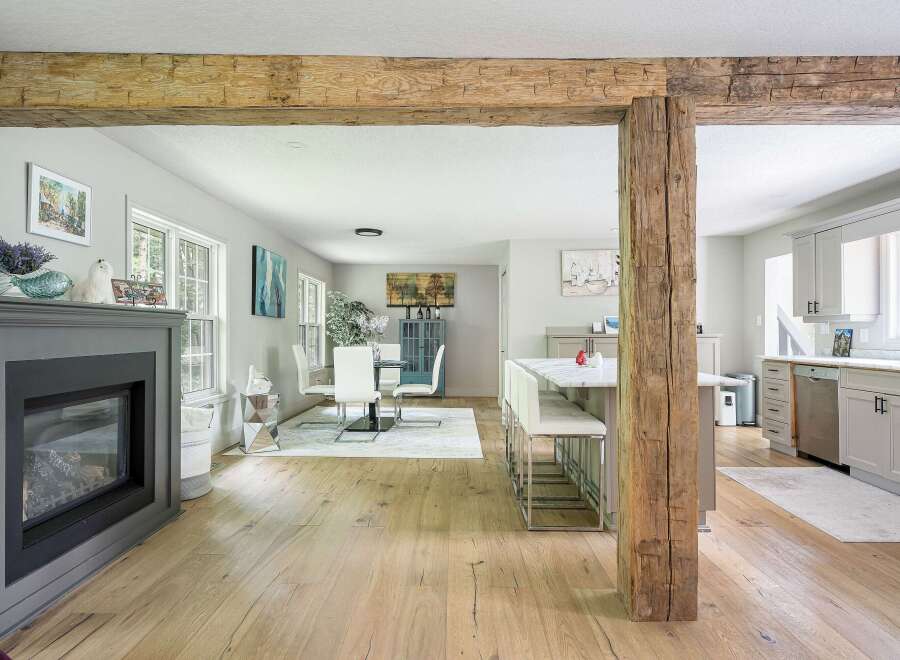Experience the perfect blend of rustic charm and modern elegance in this open-concept living space.
