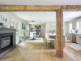 Experience the perfect blend of rustic charm and modern elegance in this open-concept living space.