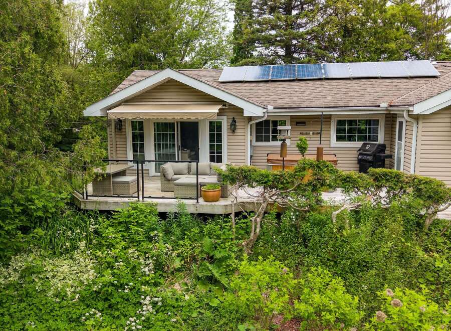 Enjoy outdoor living at its finest with this charming home featuring a spacious deck perfect for entertaining.