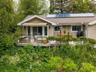 Enjoy outdoor living at its finest with this charming home featuring a spacious deck perfect for entertaining.