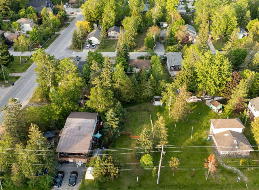 Discover this charming property nestled amongst mature trees, offering a serene and private retreat.
