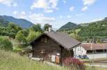 Nestled amidst the breathtaking Swiss Alps, this charming wooden chalet offers a serene mountain retreat.